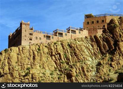 Casbah on the rock in mountain, Morocco