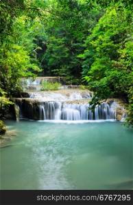 Cascading falls in tropical rain forest, Thailand