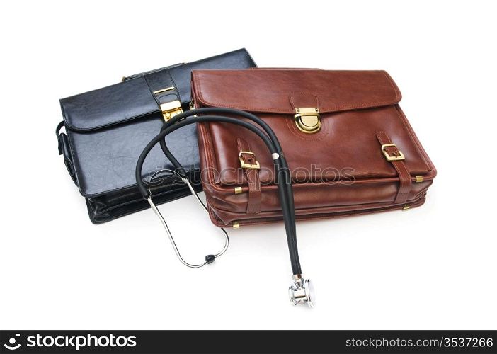 Cases and stethoscope isolated on the white