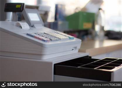 Cash register in a shop: Customer is paying purchase