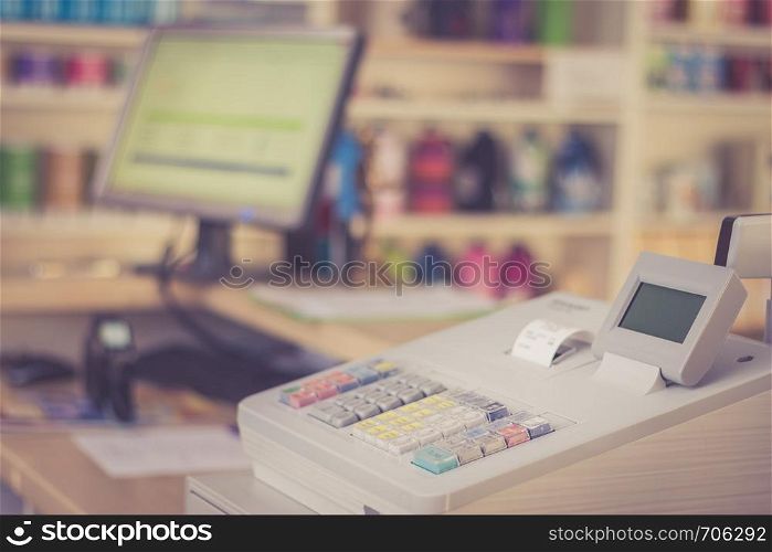 Cash register in a shop: Customer is paying purchase