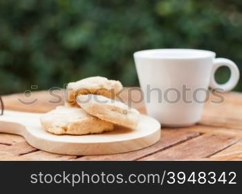 Cashew cookies with coffee cup, stock photo