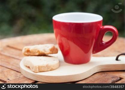 Cashew cookies with coffee cup, stock photo