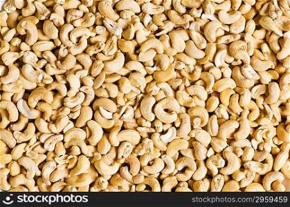 Cashew nuts arranged at the background