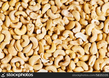 Cashew nuts arranged at the background