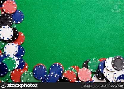 Casino chips on a green felt - background image