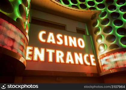 Casino entrance with big neon red letters