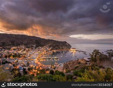 Casino in Avalon on Catalina Island. Panorama on Catalina Island off California at sunset with harbor at Avalon. Casino in Avalon on Catalina Island