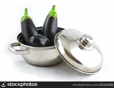 Casserole with eggplant on white background. Lid to the side