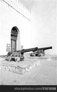 castle and cannon near the wall in oman muscat the old