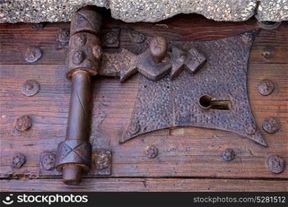 castle lock spain knocker lanzarote abstract door wood in the red brown