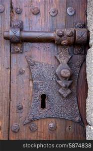 castle lock spain knocker lanzarote abstract door wood in the red brown &#xA;
