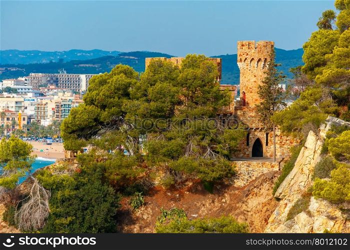Castle on the beach in the northern part of the beach in popular holiday resort Lloret de Mar on Costa Brava in the morning , Catalunya, Spain