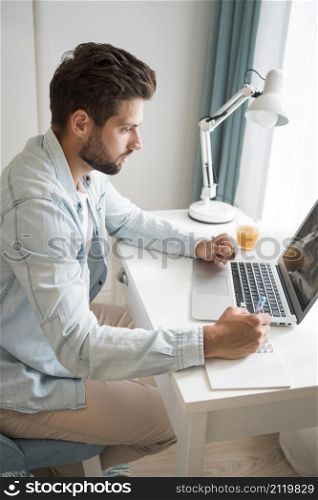 casual adult male working from home