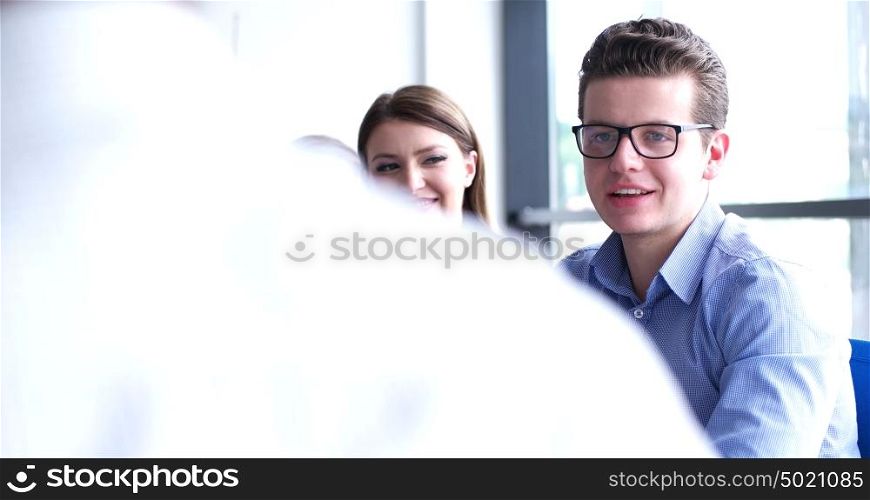 casual business people having meeting in corporate enviroment
