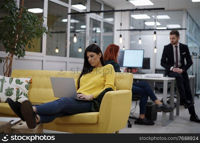 casual business woman at work  in creative modern coworking startup open space office