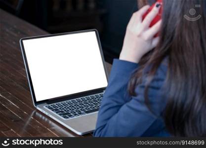 Casual business woman works online on laptop which hand on keyboard in her house Isolated screen in laptop  blank white screen 
