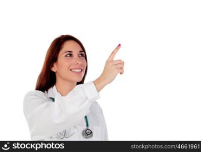 Casual doctor with brown eyes indicating something with the finger isolated on a white background