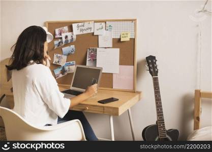 casual dressed woman working from home