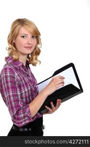 Casual female worker holding folder