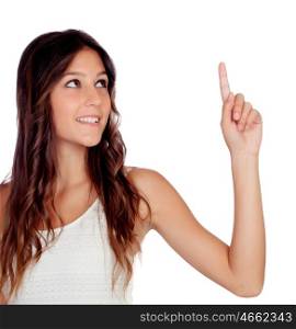 Casual girl indicating something with her finger isolated on a white background