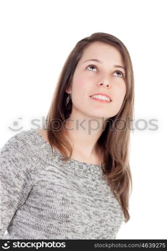 Casual girl looking up isolated on a white background