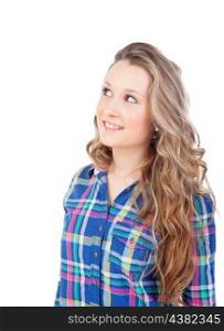 Casual girl with blue shirt looking up isolated on a white background
