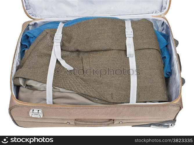casual jacket packed in suitcase isolated on white background