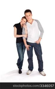 Casual loving couple posing together on white isolated background
