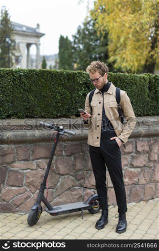 casual male posing with electric scooter 14