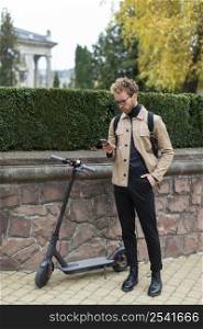 casual male posing with electric scooter 14