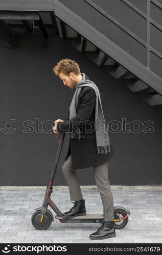 casual male posing with electric scooter 27