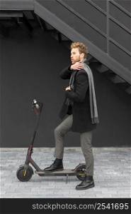 casual male riding electric scooter 10