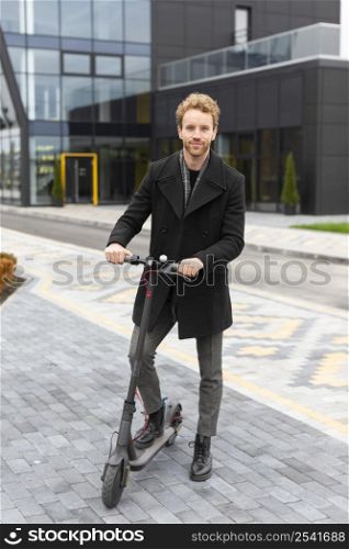 casual male riding electric scooter 3