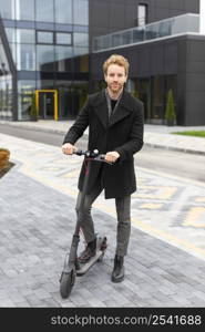 casual male riding electric scooter 3