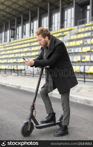 casual male riding electric scooter 8