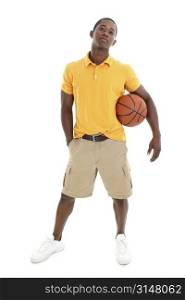 Casual man dressed in yellow pullover shirt and khaki shorts holding basketball.