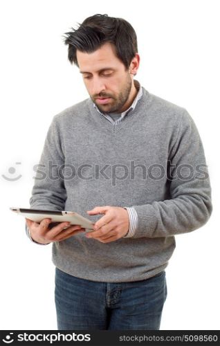 casual man looking to his tablet pc, isolated