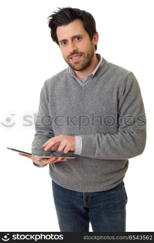 casual man looking to his tablet pc, isolated. working
