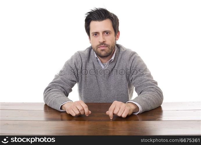 casual man on a desk, isolated on white background. casual man on a desk