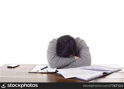 casual man sleeping on a desk, isolated on white background
