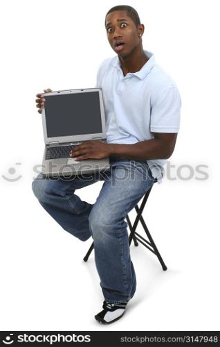 Casual Man with Laptop Computer and Shocked Expression on Face.