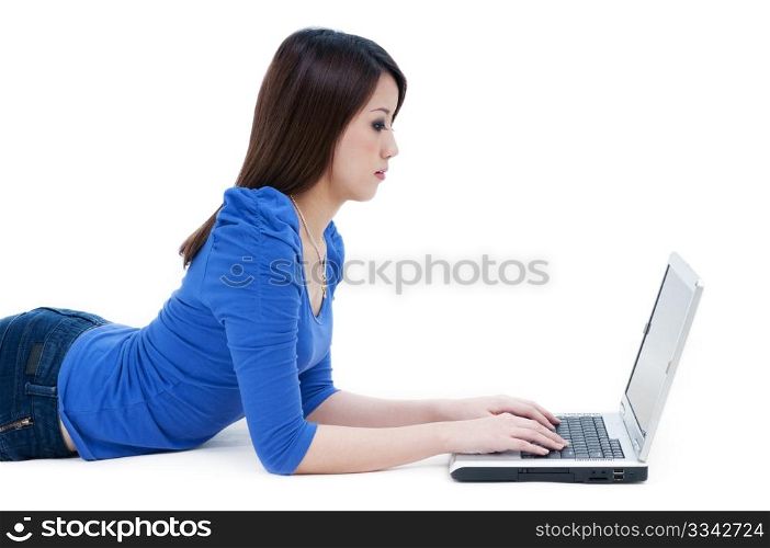 Casual student using laptop over white background