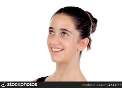 Casual teenager girl smiling looking up isolated on a white background