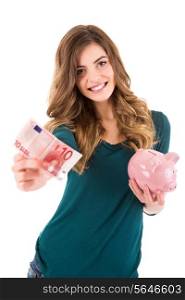 Casual woman looking to save money in a piggy bank