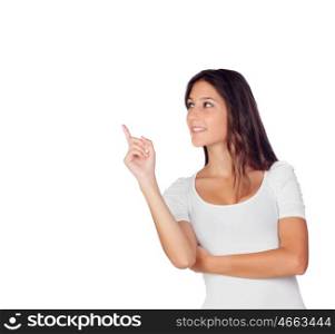 Casual young girl pointing something at side isolated on a white background