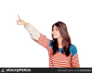 Casual young girl pointing something isolated on a white background