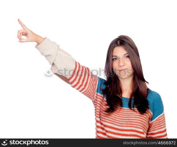 Casual young girl pointing something isolated on a white background