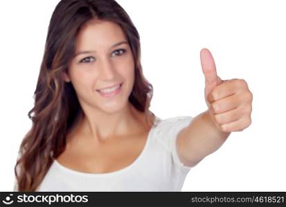Casual young girl saying Ok with the focus on his finger isolated on a white background