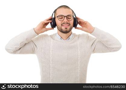 Casual young man listening music with headphones, isolated on white background. listening music